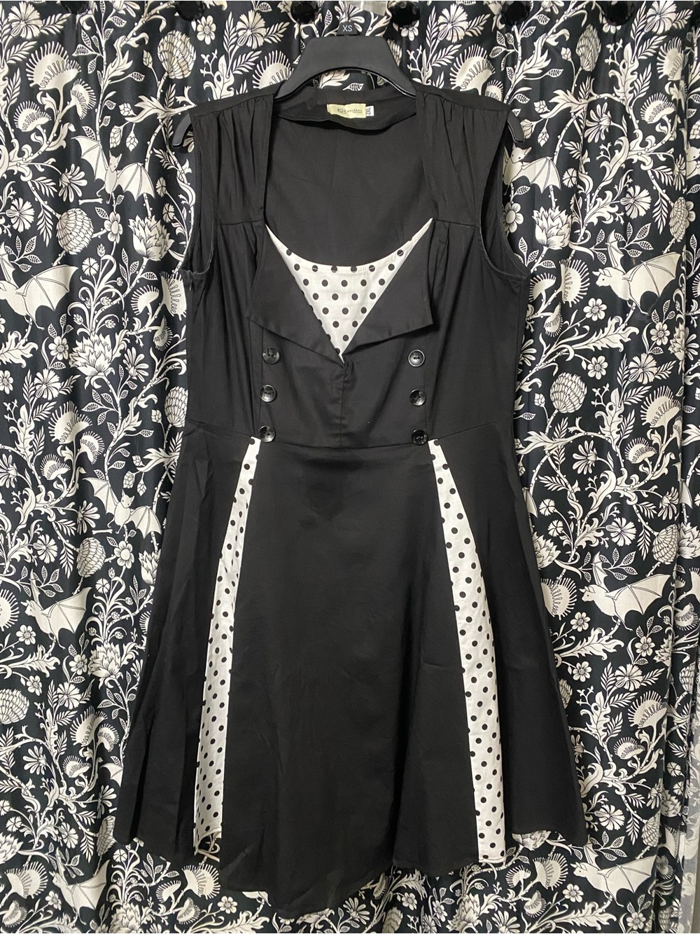 Sleeveless Black Mini Dress with White Polka Dot Insets